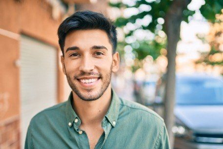 Man with attractive smile after cosmetic dentistry