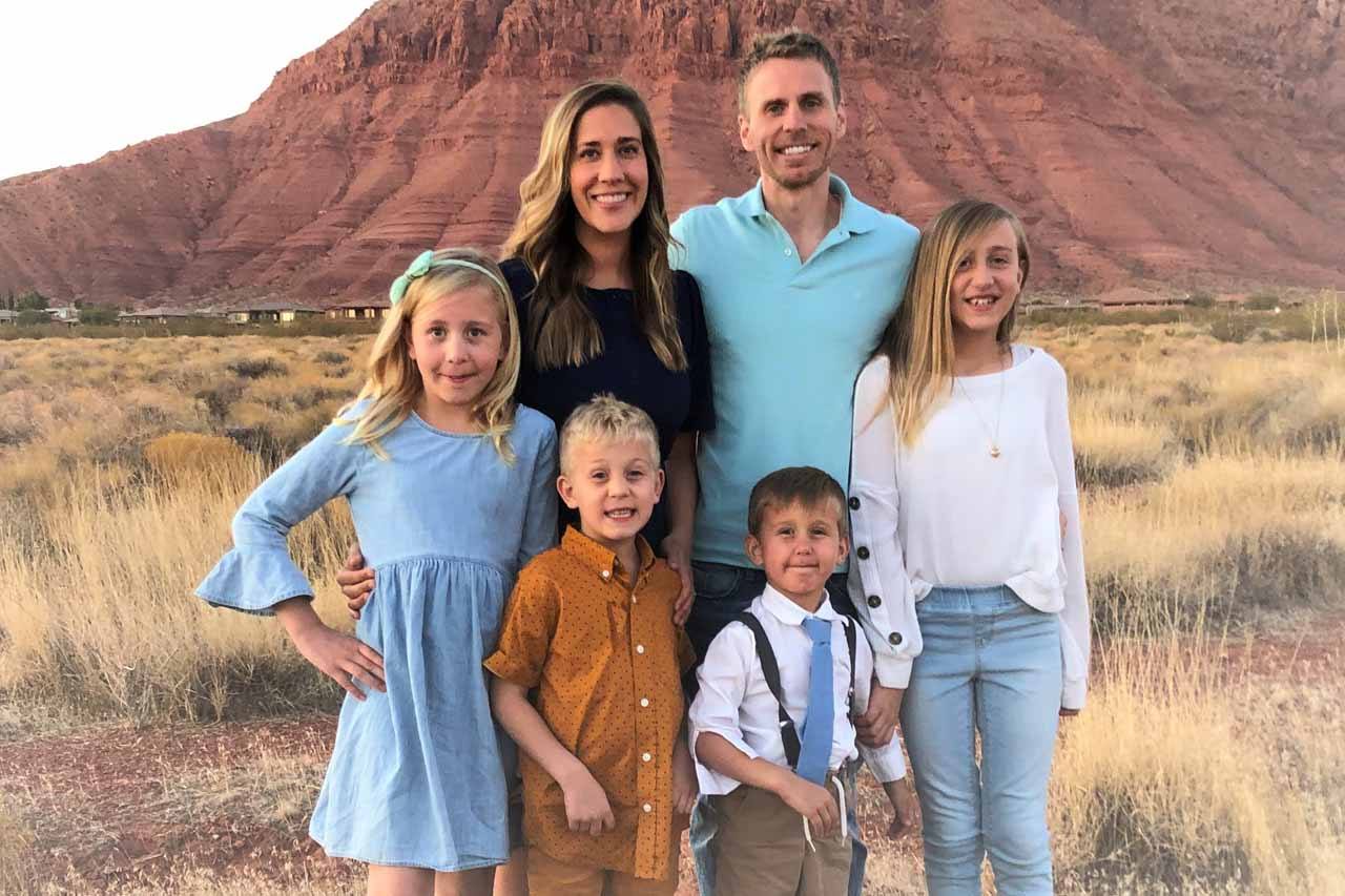 Cottonwood Heights Utah dentist Doctor J D Hansen smiling with his family