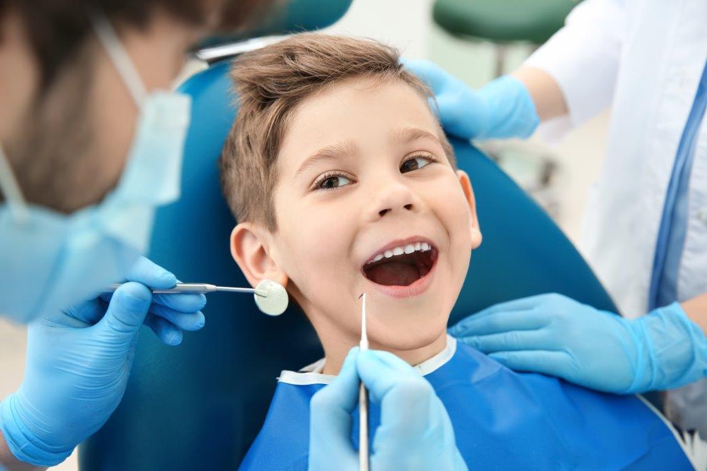 Child receiving a dental exam