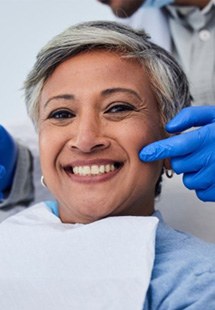 patient smiling after undergoing cosmetic dentistry near Salt Lake City