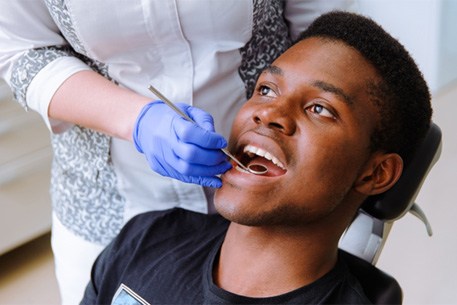 patient getting dental checkup in Cottonwood Heights