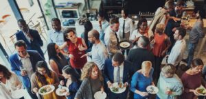 Big social gathering with many people crowded around.